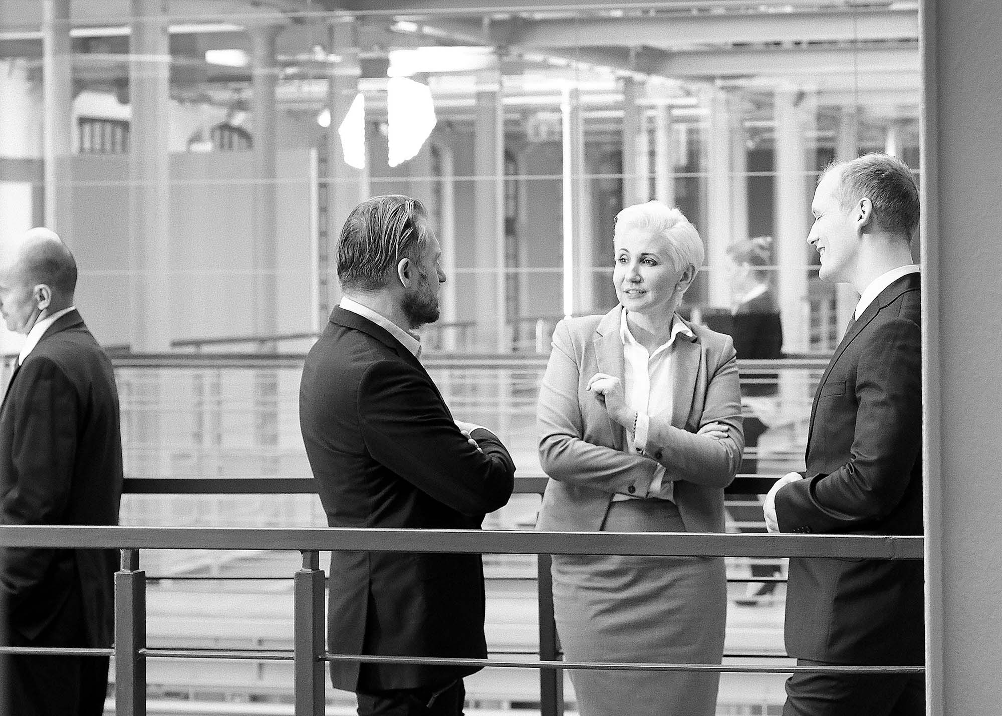 officemates talking inside the office